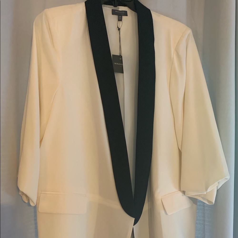 White and black blazer